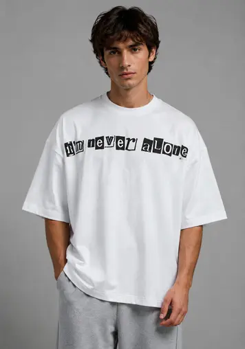 Men wearing black and white graphic oversized cotton t‑shirt, front view, OEM clothing manufacturer