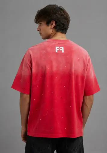 Male model side angled view wearing Print Logo Rhinestone Washed T-Shirt, oem apparel manufacturer