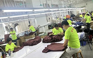 Garment finishing and final inspection area at Minghang Garments